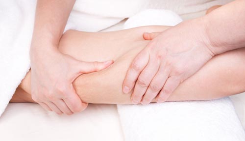 Deep tissue massage in the leg area